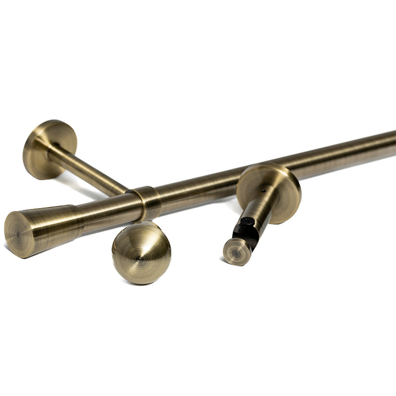 Une paire de supports de tringle à rideaux anciens en bronze , style