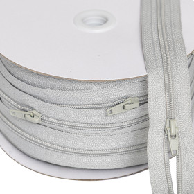 Fermeture à glissière 5 mm gris fumé - rouleau de 25 mètres Fermeture à glissière 5 mm gris fumé - rouleau de 25 mètres | Artap...