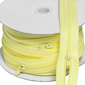 Fermeture à glissière 5 mm jaune - rouleau de 25 mètres Fermeture à glissière 5 mm jaune - rouleau de 25 mètres | Artapisse...